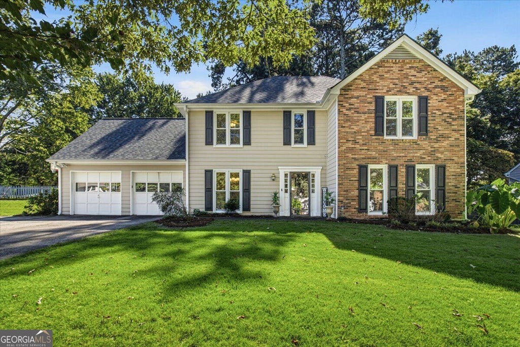 Photo of 5084 Williamsport Drive, Peachtree Corners, GA 30092 (MLS # 10870484)