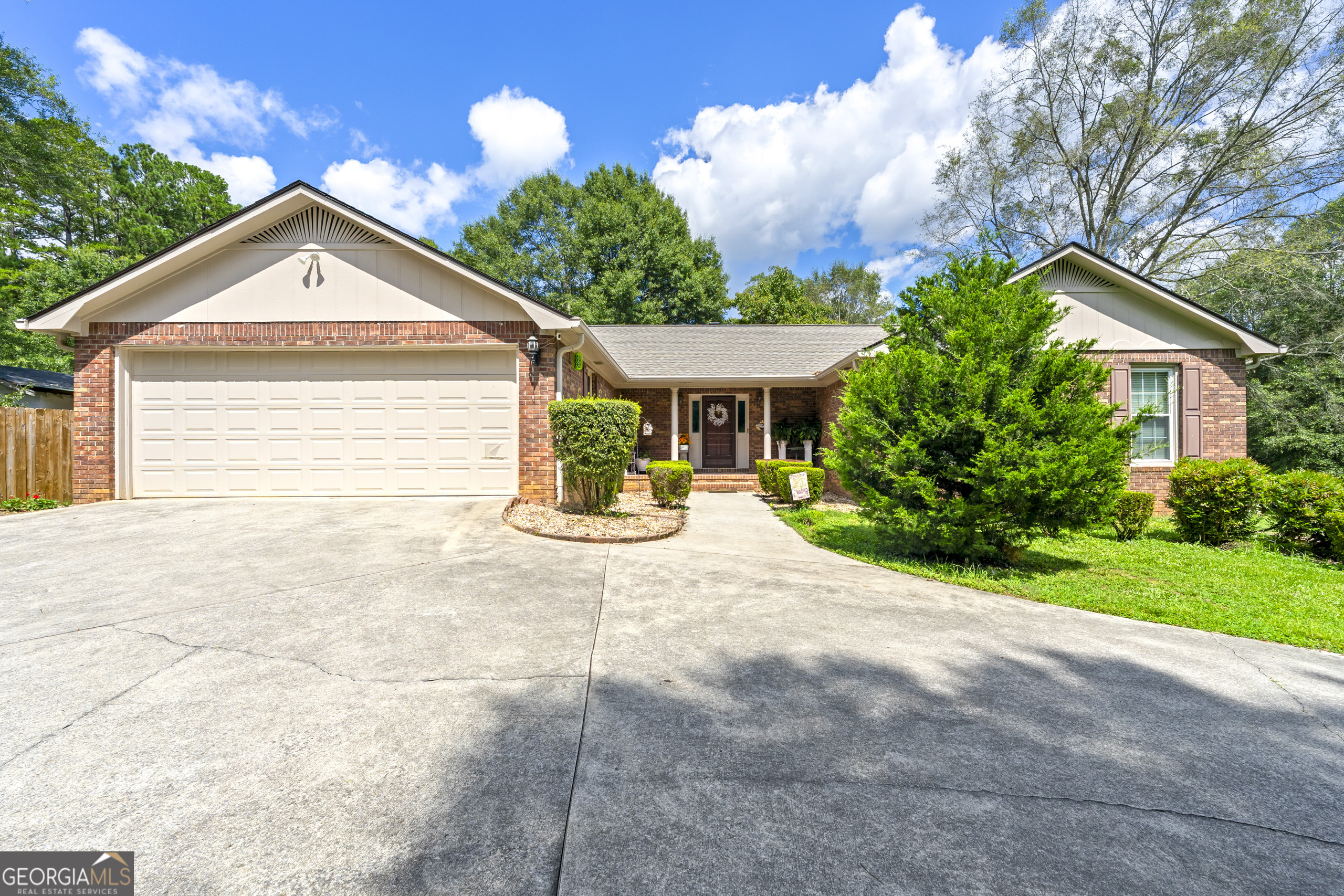 Discover this beautifully maintained 3-bedroom, 2-bath ranch home situated on a spacious 2-acre lot. The inviting sunk-in living room features a cozy gas-log fireplace and elegant wooden blinds, creating a warm and welcoming atmosphere. The master suite offers a walk-in closet and a private bath with both a relaxing tub and a walk-in shower. The kitchen is designed for both style and function, boasting wooden cabinets, tile flooring, a central island, new dishwasher, new microwave, and a walk-in pantry. Enjoy the convenience of a dedicated laundry room complete with a sink, abundant cabinets, extra storage, and a built-in ironing board. The sunroom, with its own gas fireplace and electrical outlets, provides the perfect year-round retreat. Additional highlights include: * Two-car garage with generous storage space * Basement with concrete floors, shelving, and cabinets * Encapsulated crawl space for added protection * New roof (June 2025) with 25-year warranty, lifetime shingles, and 10-year labor guarantee * Pull-down attic stairs and a central vacuum system This property combines the peace of country living with modern conveniences, making it the perfect place to call home.