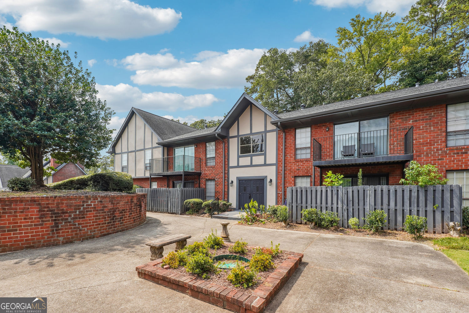 STUNNING RENOVATION, large 2 bedroom/2bathroom condo in the heart of Sandy Springs. This walk-in level unit boasts a bright white kitchen w/ wood accent walls giving a modern urban vibe. The quartz counter tops and black Kohler farm sink puts this kitchen over the top! This home has natural oak LV floors, fresh paint & designer lighting throughout. Above counter designer sinks in both bathrooms for that added touch. Oversized master suite w/ en-suite master bath with double vanity and white quartz counter tops. Master has a huge walk-in closet...no one will be fighting over the space in this closet. Great location! This unit is truly a hidden gem in Sandy Springs.