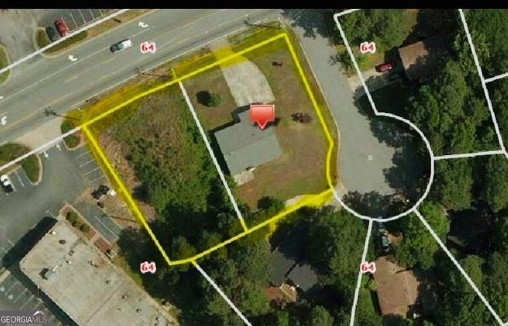 Photo of 1065 Dickens Road NW, Lilburn, GA 30047 (MLS # 10699621)