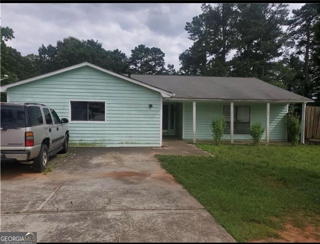 Photo of 1065 Dickens Road NW, Lilburn, GA 30047 (MLS # 10699621)