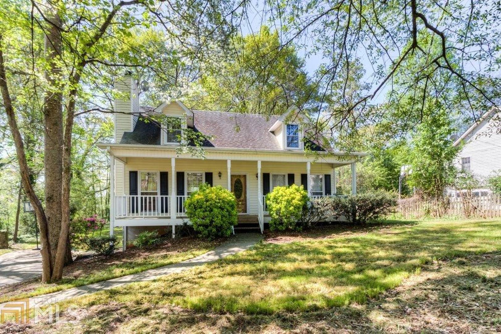 Charming Cape Cod nestled in the quiet subdivision of Cherokee Meadows Subdivision. Escape the city to your own wooded back yard! This master on main home has 3 generous size bedrooms, 2 bathroom and covered rocking chair porch. House has been freshly painted downstairs with new carpet. Convenient to downtown Woodstock, shopping, parks.