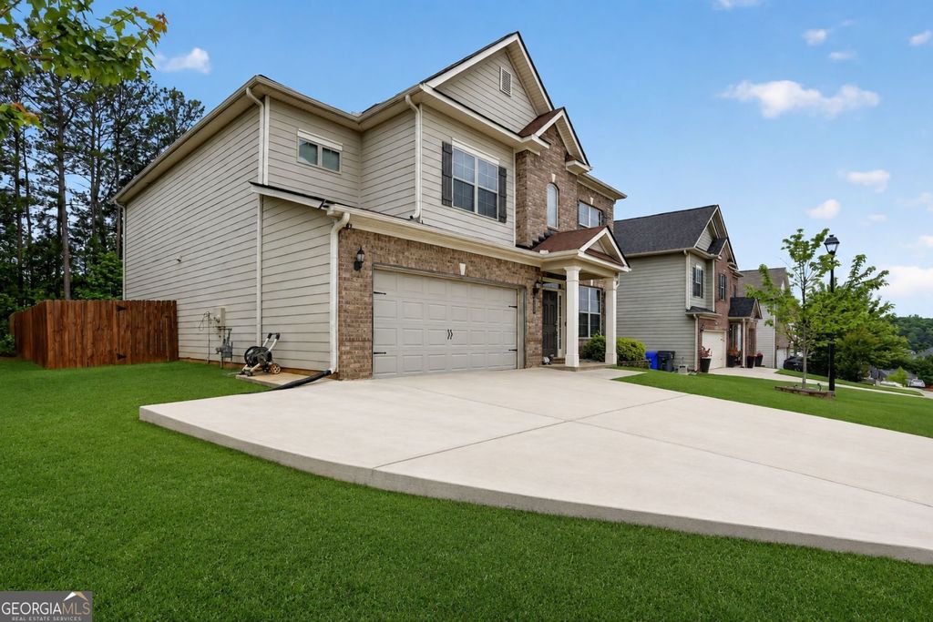 Photo of 2119 Dodson Woods Drive, Fairburn, GA 30213 (MLS # 10771316)