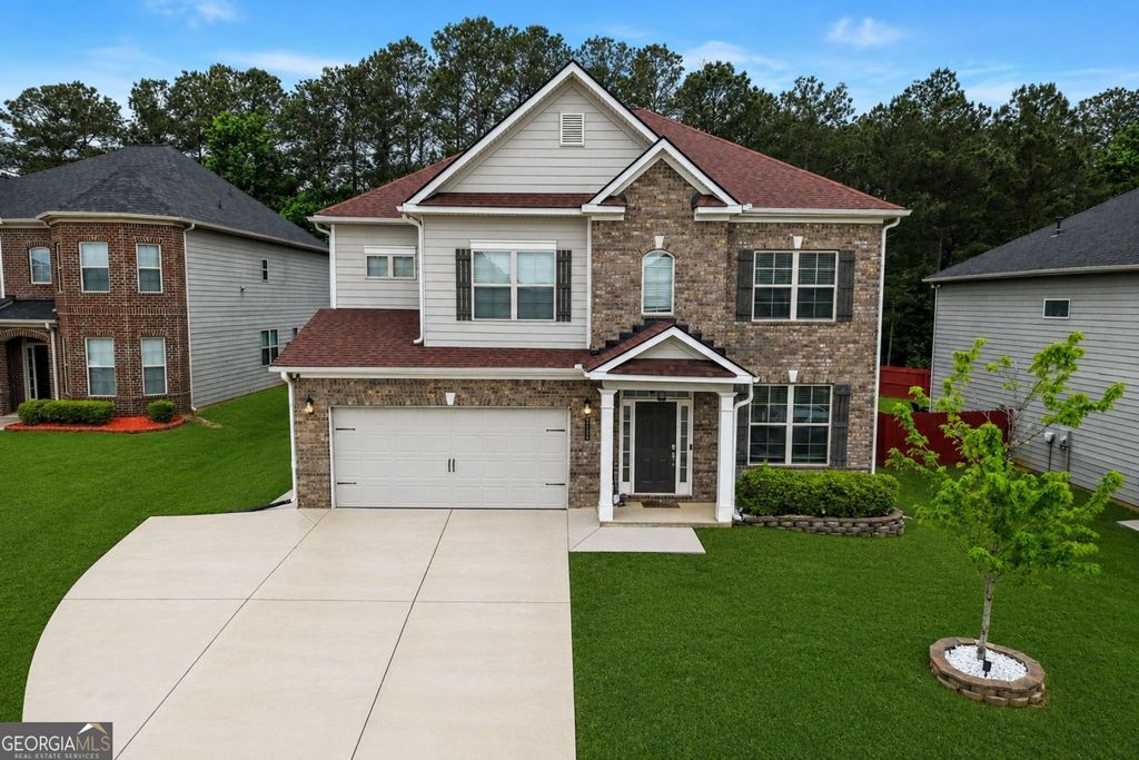 Photo of 2119 Dodson Woods Drive, Fairburn, GA 30213 (MLS # 10771316)