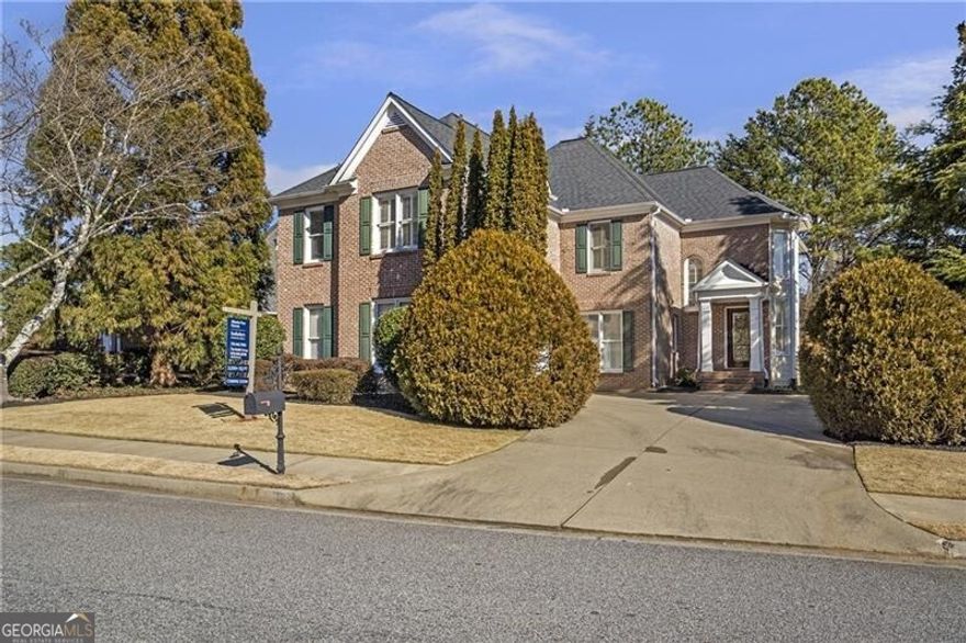 This charming traditional home is located in the highly desirable East Park subdivision. The bright two-story foyer welcomes you into a spacious formal living room or study and a formal dining room. The kitchen boasts white cabinetry, granite countertops, stainless steel appliances, a gas cooktop with double ovens, and a cozy breakfast nook, all overlooking the inviting fireside family room. Step outside to a serene screened patio, perfect for relaxing and enjoying the private, wooded, and fully fenced backyard. A half bath and large laundry room complete the main level. Upstairs, you'll find three generous bedrooms, two full baths, and a versatile loft space. The oversized owner's suite offers a perfect space for a nursery, sitting area, office, or exercise room, along with French doors leading to a luxurious bath with double vanities, a tile shower, a separate soaking tub, and a spacious, custom-built walk-in closet. The beautifully landscaped lot is tucked away in a peaceful cul-de-sac. Residents of this sought-after, amenity-rich community enjoy a clubhouse, pool, tennis courts, walking trails, and easy access to shopping, dining, and the Sandy Plains/East Cobb/Marietta Square area.