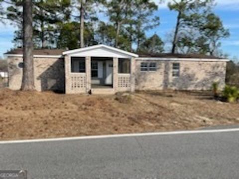 Photo of 306 Dennard Street, Unadilla, GA 39817 (MLS # 10698336)