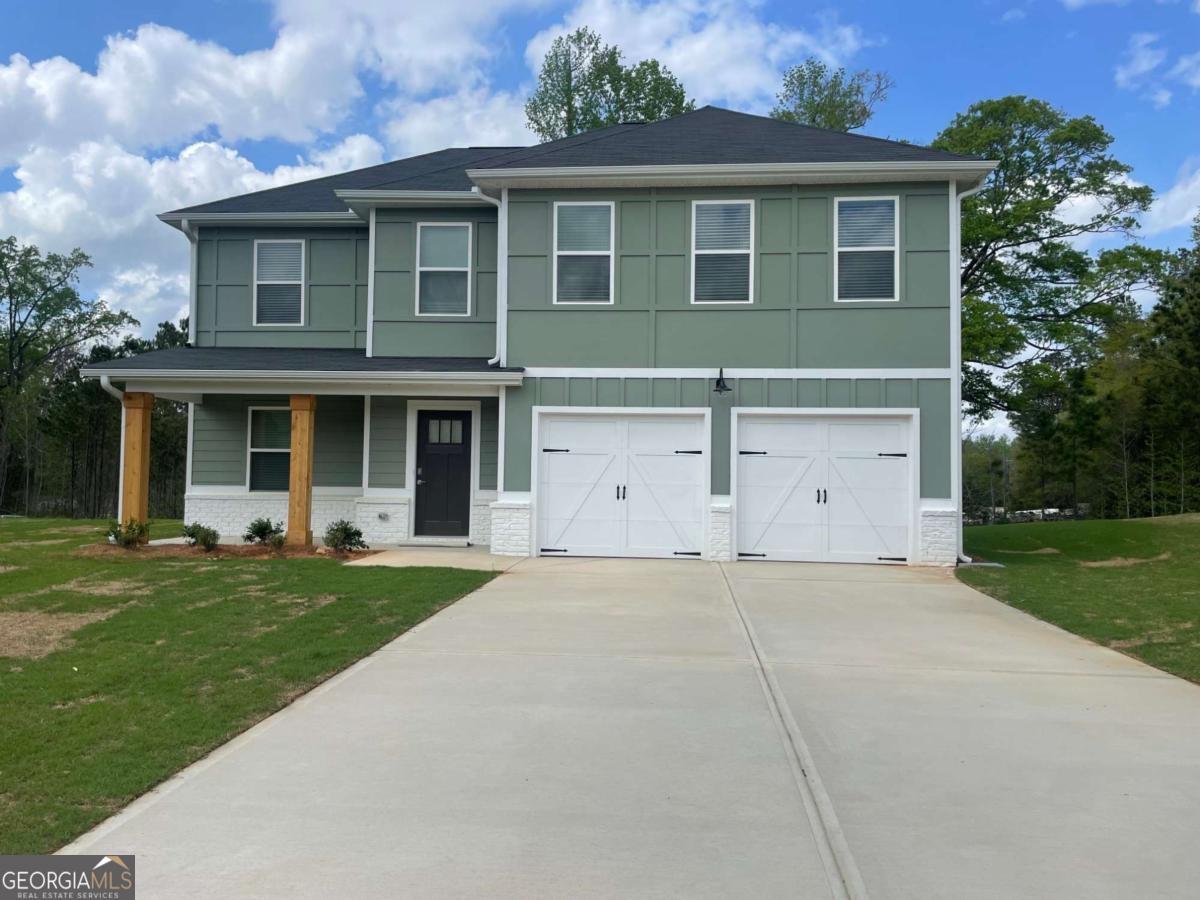 The Tucker is a spacious four bedroom two and a half bath home. This open concept design provides an easy flow from the kitchen to family room, great for entertaining. Upstairs you will find a loft, laundry room, full bath, and four bedrooms including the cozy owner's suite with a private bathroom and walk-in closet. The home also includes full house blinds, granite countertops, LED lighting, Stand Alone Tub, Smart Toilet, Smart Home System, and more. The convenient location is a PLUS with just minutes away from shopping, dining, entertainment and parks with easy access to Interstate I-85. "Not Actual Home"