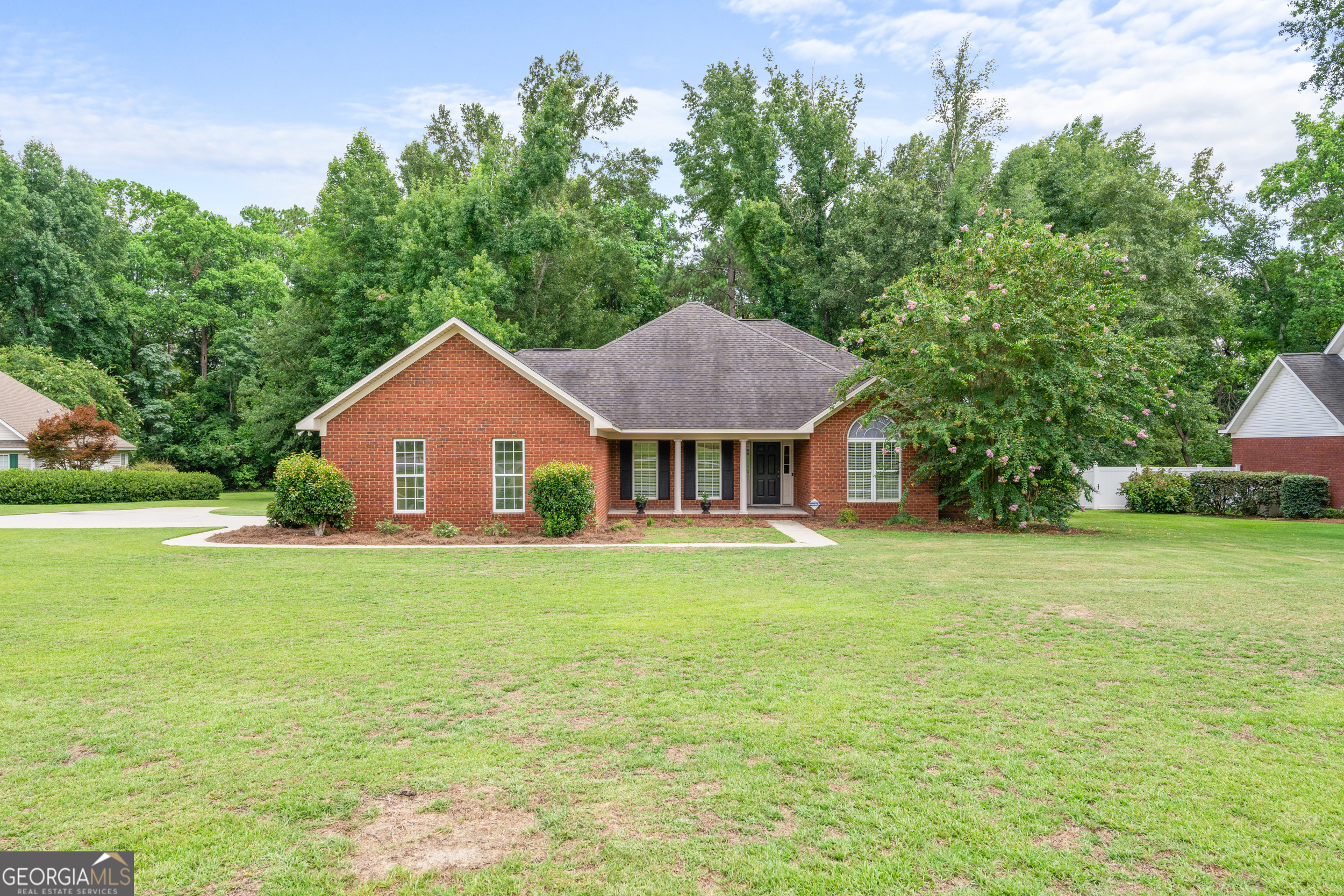 This charming 3 Bedroom 2.5 Bathroom brick house in highly sought after Hunters Pointe Subdivision is a must see! As you walk in, you are welcomed by high ceilings and wood floors, a classic formal dining room and a spacious living room with a gas fireplace and custom built-in bookcase. The eat-in kitchen features a generous size breakfast area, stainless steel appliances, a new gas stove, and an island plentiful in storage and countertop space! The master suite features tray ceilings, a walk-in closet, and a bathroom adorned with a double vanity, separate shower, and a large garden tub perfect for relaxing! There is also a full laundry room, as well as a two-car garage with a large storage room! And don't miss the best room in the house...a beautiful sunroom overlooking a wooden rear deck and large backyard that is perfect for family time or entertaining friends! All in a quaint neighborhood within close proximity to town, and wonderful amenities like a community pool, tennis courts and playground! Call today to schedule your private tour!