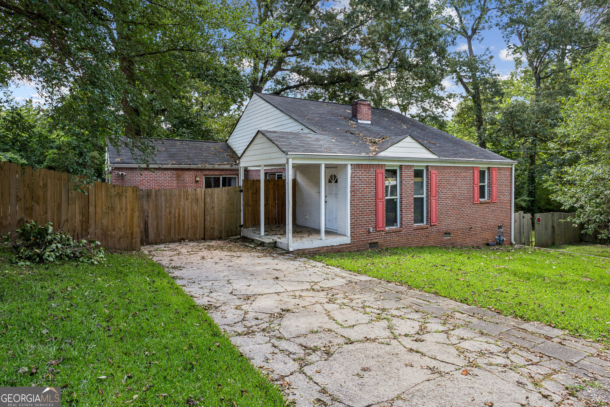 Welcome home to this spacious brick ranch, offering 5 bedrooms and 2 full bathrooms! Inside, you'll find a generously sized living room with a cozy fireplace, a bright kitchen with an island, a dedicated laundry room, and abundant natural light throughout.The open layout creates a perfect setting for both relaxing and entertaining, with ample space for everyday living. Ideally located just minutes from Hartsfield-Jackson Airport, downtown Atlanta, and major highways, this home offers the perfect blend of space, convenience, and charm.