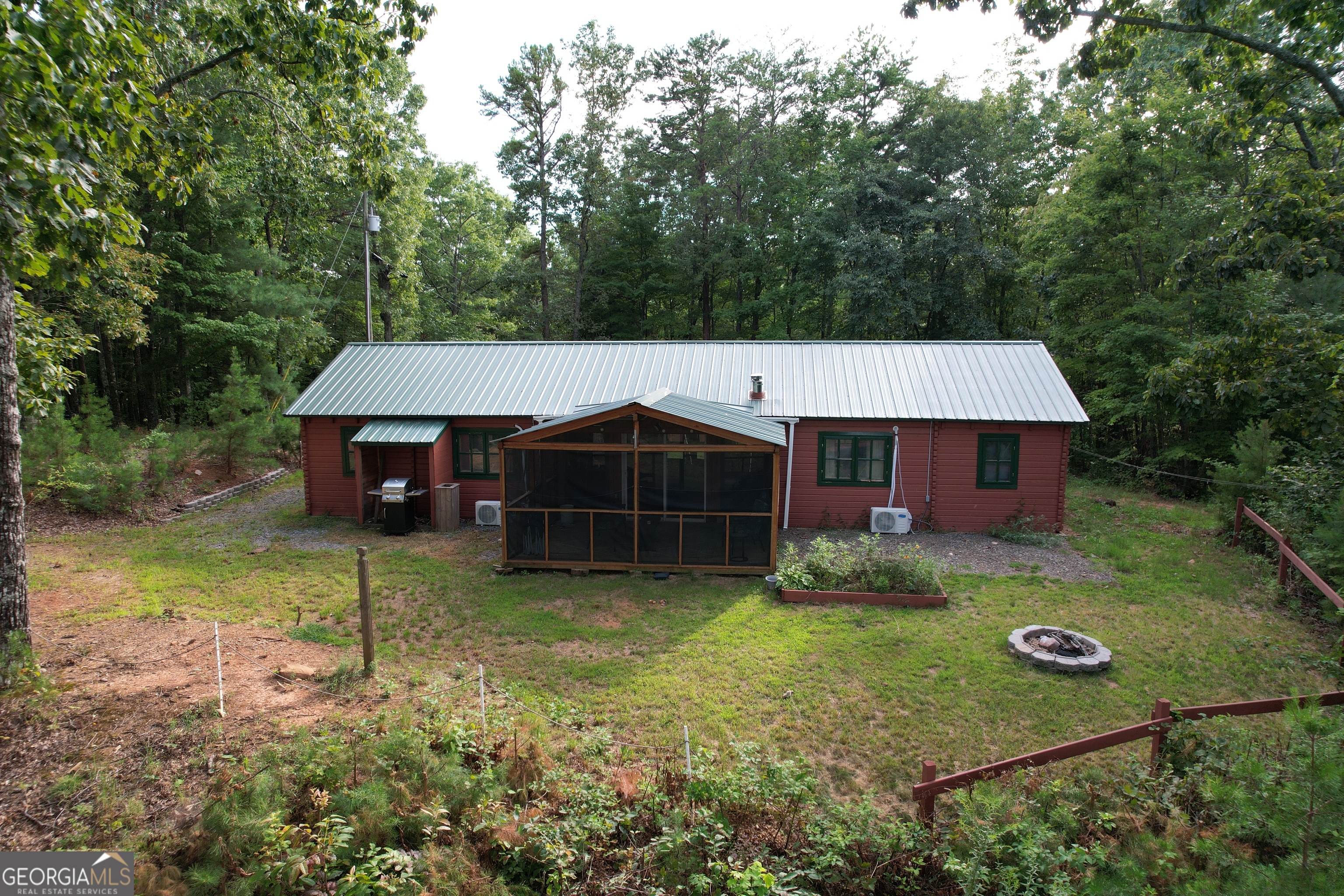 This Airbnb is THE CUTEST! The primary home has 2 bedrooms / 2 baths and the guest house has 1 bedroom and 1 bath. Absolutely breathtaking year round long range mountain views will not disappoint as you enjoy making memories on the generous screened in porch...At night, the fire pit awaits while you enjoy your favorite beverage with friends under the stars. Has been used as an AirBnB and has wonderful reviews! Simple, efficient layout, private setting, FULLY FURNISHED, listed under appraisal value and priced to sell! Did we mention FULLY FURNISHED? Welcome Home!