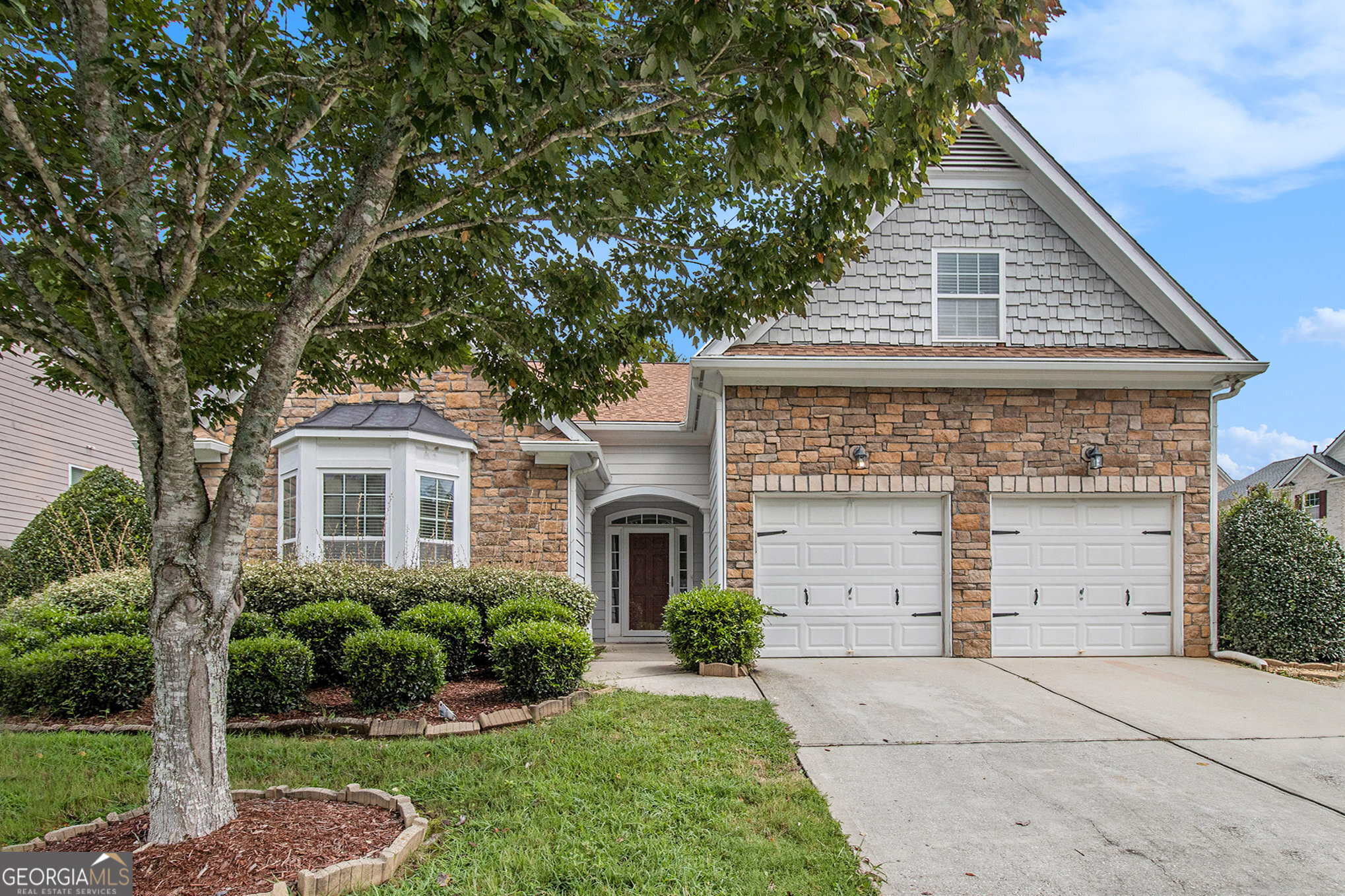 This beautiful 3-bedroom, 2-bath ranch offers a family-friendly layout with a cozy fireplace in the family room, an eat-in kitchen, and a separate dining room ideal for entertaining. Upstairs, a versatile bonus room provides extra space for work, play, or hobbies. The main-level primary suite is a true retreat, featuring a sitting area, a spa-inspired ensuite with separate shower and soaking tub, and a generous walk-in closet. Step outside to a fenced backyard with a back deck perfect for gatherings, all on a desirable corner lot. With a 2-car garage and a thoughtful layout designed for both comfort and convenience, this home is ready for your family to move in and make it their own.