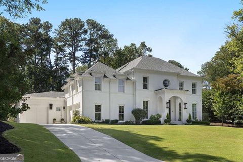 Photo of 715 Amberidge Trl, Atlanta, GA 30328 (MLS # 10671068)