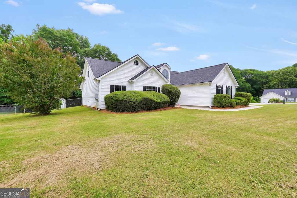 Photo of 2001 Big Cypress Lane, Locust Grove, GA 30248 (MLS # 10764484)