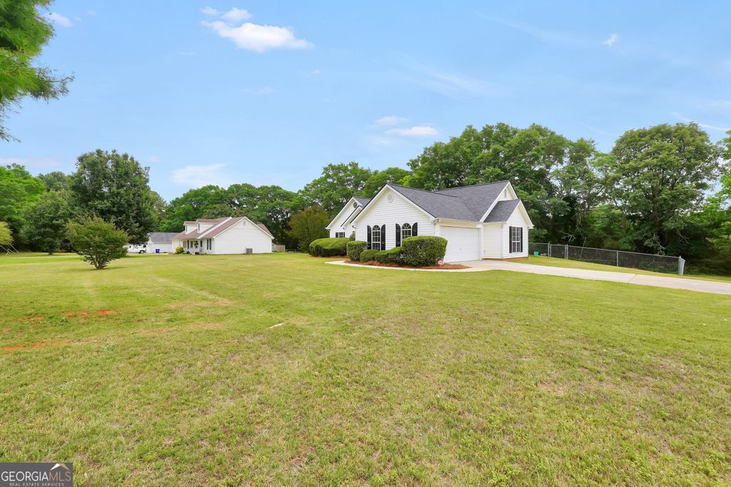 Photo of 2001 Big Cypress Lane, Locust Grove, GA 30248 (MLS # 10764484)