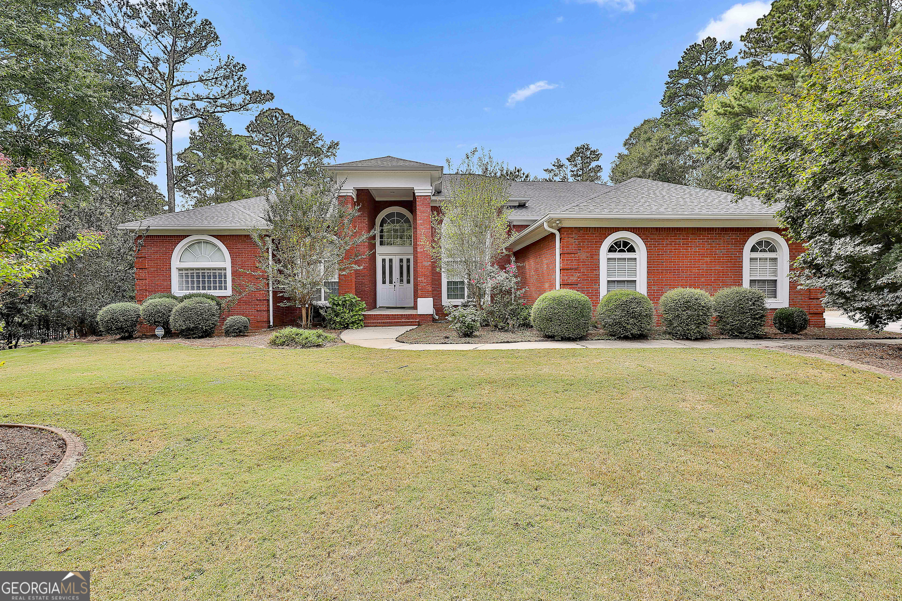 Discover this stunning 4-sided brick ranch in the Northgate High School District, offering timeless design, modern upgrades, and plenty of space. Step inside through the grand 2-story foyer, where you're welcomed by a formal dining room and a versatile sitting room/office with custom built-in bookcases. The heart of the home is the living room with soaring ceilings, built-in bookcases, and a cozy fireplace, flowing into the newly remodeled kitchen. Here you'll find brand new countertops, tile backsplash, upgraded appliances, abundant cabinetry, and an eat-in dining area that leads to the expansive back deck. The oversized primary suite has elegant tray ceilings and a spa-like en suite bath that has been beautifully updated with dual sinks, an upgraded tile shower, soaking tub, and a spacious walk-in closet. A guest suite with its own en suite bath offers comfort and privacy, while two additional bedrooms share a full bath. Upstairs, a loft area provides the perfect spot for a second living room, playroom, or media space. Enjoy year-round relaxation in the sunroom or on the large deck with a covered section, overlooking the flat, fenced backyard. Additional highlights include brand new hardwood flooring throughout, fresh interior paint, a 3-car garage, newer roof, newer HVAC units, and a tankless water heater with circulatory system. Southeast Mortgage is our preferred lender. If buyer chooses to work with them, Southeast Mortgage will provide 1% credit up to $5,000. Reach out to the listing agent for more information.