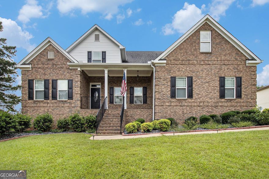 Beautiful four-sided brick home located on the golf course with a backyard oasis featuring an in-ground pool and hot tub. The main level boasts a spacious primary suite along with an oversized dining room that's perfect for gatherings, a fireside living room, and a well-appointed kitchen with stained cabinets, granite countertops, and plenty of workspace. Upstairs you'll find two secondary bedrooms and a versatile bonus room. The finished basement offers even more living options with a bonus room, additional bedroom, full bathroom, and a third garage. With sweeping golf course views and a floor plan designed for both entertaining and everyday comfort, this home truly has it all.