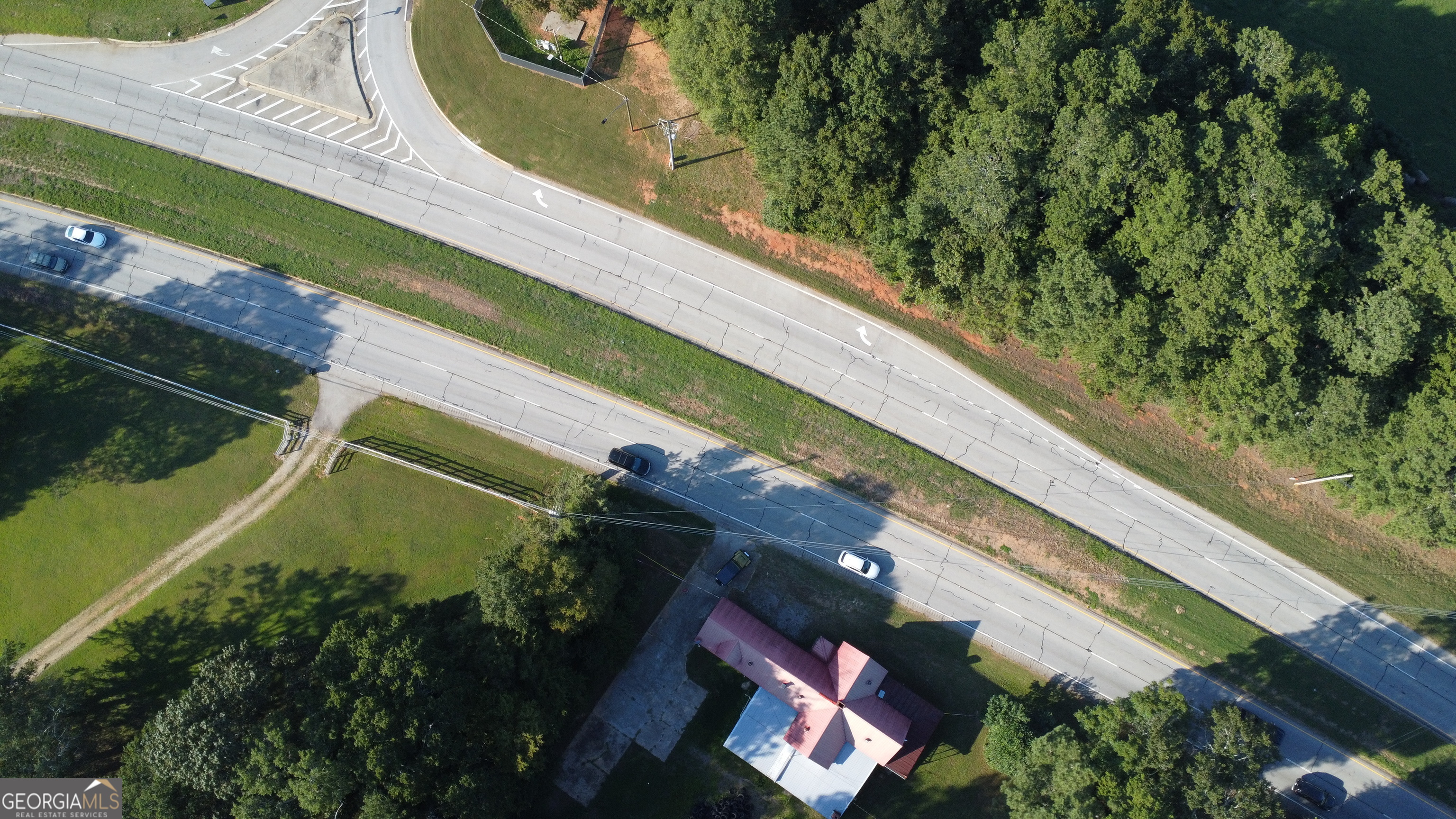POTENTIAL COMMERCIAL PRIME 5+ ACRE OPPORTUNITY This property offers 5+ acres of land with 403 feet of road frontage directly on Highway 78, providing excellent visibility and accessibility. While there is an existing structure on-site, it is a total tear-down, making this an ideal blank canvas for your vision. Currently zoned residential, the property holds strong potential for commercial use with the right approvals, making it perfect for investors, developers, or business owners seeking a high-traffic location. Don't miss this rare chance to own a large tract of land in a prime growth corridor with endless possibilities.
