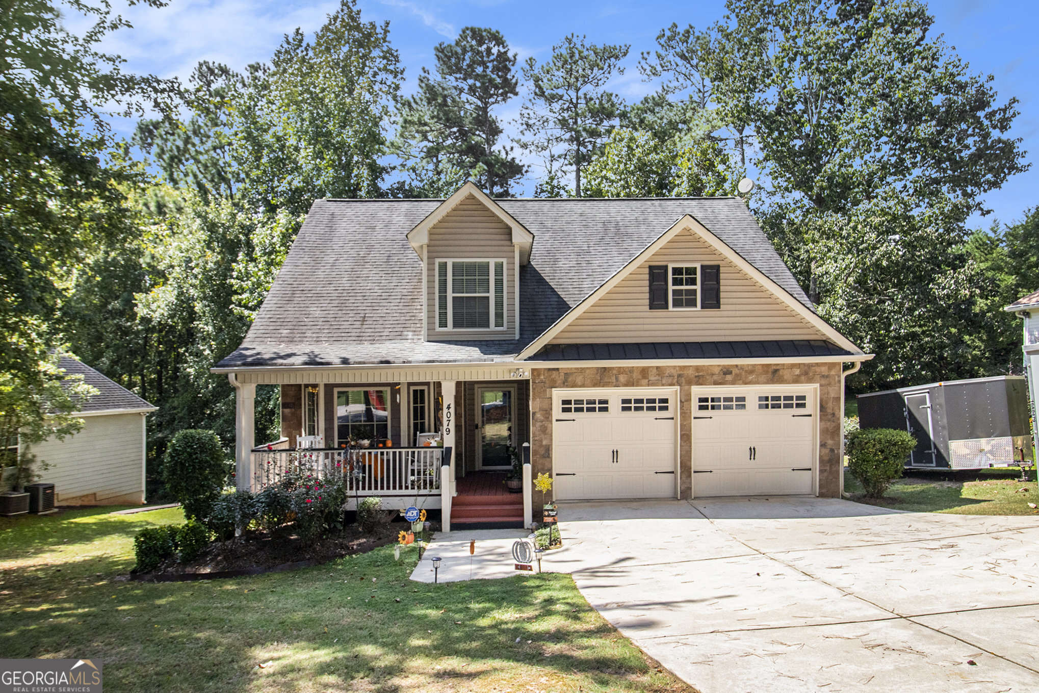 Welcome home to this beautiful 3-bedroom, 2.5-bathroom residence located in the highly desirable, gated community of Fairfield Plantation in Villa Rica, GA. This thoughtfully designed home offers the perfect blend of comfort, space, and style-ideal for both everyday living and entertaining. Step onto the inviting covered front porch, perfect for rocking chairs and morning coffee, and enter into a spacious, light-filled interior. The heart of the home is the large kitchen, offering generous counter space, ample cabinetry, and a seamless flow into the open-concept living and dining areas. The primary suite is conveniently located on the main level, providing a peaceful retreat with privacy and ease of access. Upstairs, you'll find two additional bedrooms and a versatile loft area-ideal for a home office, playroom, or media space. Enjoy outdoor living in the private backyard, complete with a spacious deck-perfect for grilling, entertaining, or simply relaxing in your own oasis. A 2-car garage provides ample parking and storage. Located in the sought-after Fairfield Plantation, you'll enjoy resort-style amenities including a championship golf course, 300-acre lake, marina, beach, tennis courts, swimming pools, walking trails, and more-all within a secure, gated setting. Don't miss the chance to make this home yours. Schedule a private showing today and experience all that Fairfield Plantation living has to offer!