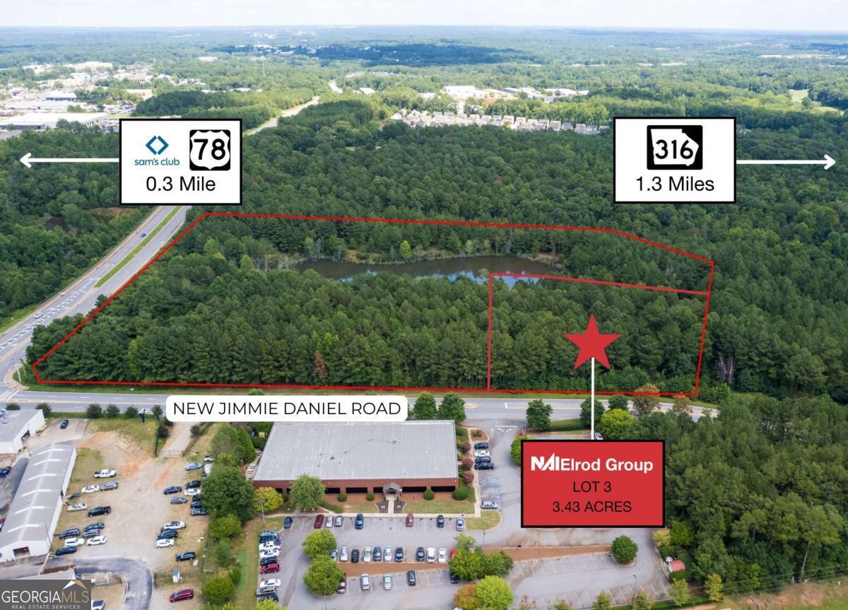 Property Description: This 3.43-acre lot is located near the corner of New Jimmie Daniel Road and Jennings Mill Parkway. Situated at a highly visible location, this property is strategically positioned within close proximity to Atlanta Highway and Epps Bridge shopping, dining, and entertainment. It is just a short distance from GA-316 and US Highway 78, and near the Atlanta Highway corridor in Athens, one of the busiest areas in Athens. With all utilities available and zoned for Employment-Industrial (E-I) use, this property offers excellent industrial and commercial development potential. Area Description: Nestled near Downtown Athens, both Athens hospital systems, and abundant shopping and dining in Athens and Oconee, the New Jimmie Daniel Rd area is conveniently located just off Atlanta Hwy in West Athens. With quick access to Hwy 78 and Hwy 316, as well as being only 13 minutes from Downtown Athens and UGA, this property offers unparalleled convenience. The bustling Atlanta Hwy corridor hosts a multitude of small businesses from various sectors. Additionally, it's close to Epps Bridge shopping and dining, and just minutes from the Piedmont Oconee Medical Campus. With proximity to Downtown Watkinsville, Downtown Athens, and a 1.5-hour drive to Downtown Atlanta and Hartsfield-Jackson International Airport, this location is a strategic asset for investors.