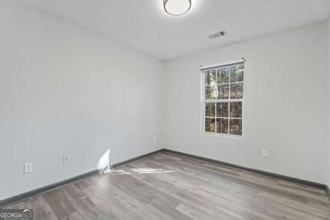 Photo of 5008 Lower Elm Street, Atlanta, GA 30349 (MLS # 10659828)