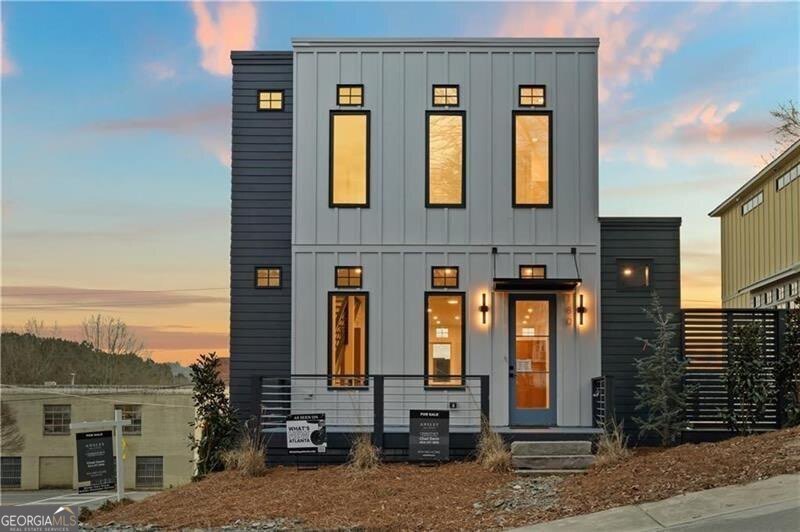 This stunning new construction home, located at the corner of Railroad and Academy Street, puts you at the heart of everything downtown Canton has to offer. Designed and built by the renowned Folia Group, this residence blends modern living with timeless charm, offering an open-concept main living area perfect for entertaining and everyday life.Flooded with natural light through expansive walls of windows, this home embodies Folia GroupCOs signature design aesthetic. With 3 bedrooms and 3.5 baths, every inch of this home has been meticulously curated, featuring designer interiors, high-end finishes, and thoughtful details throughout. The combination of clean, modern lines and timeless elegance creates a home that is both sophisticated and welcoming.  Step outside and enjoy your own private outdoor patio space, ideal for relaxing or hosting guests. Living here means youCOre just steps away from boutique shopping, local eateries, and the vibrant entertainment district at The Mill. For outdoor enthusiasts, the nearby Etowah River and North Georgia Mountains offer endless recreational opportunities. In addition to its prime location, this home is part of Cherokee CountyCOs highly-rated school district, ranked among the top 10% in Georgia. This beautifully crafted home captures the essence of small-town charm paired with a vibrant community spirit, making it the perfect place to call home. DonCOt miss the opportunity to make this exquisite residence yours! Schedule your showing today.