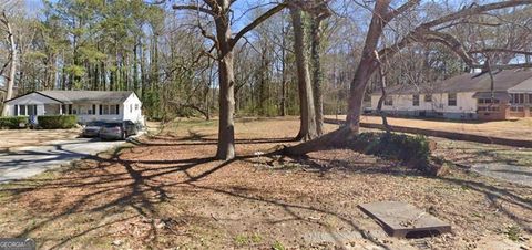 Photo of 691 GARY Road NW, Atlanta, GA 30318 (MLS # 10598187)