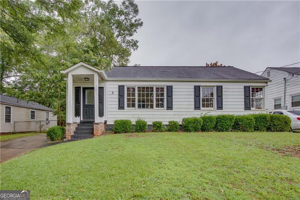 Charming Opportunity in Historic College Park! Don't miss this incredible opportunity to own a home in the highly sought-after community of Historic College Park. This 2-bedroom, 1-bath home is full of potential and ready for your personal touch. Features include a spacious family room with hardwood floors throughout and an eat-in kitchen with ample storage. Two generously sized bedrooms share a full hall bath. Please note: the property is being sold as-is. The HVAC system is not operational, and the roof is in need of repair or replacement. The seller has never occupied the home. Conveniently located near Hartsfield-Jackson Airport, all major Atlanta highways, Delta, Porsche, Tyler Perry Studios, and within walking distance to Woodward Academy's Main Campus