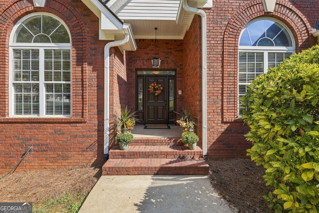 Photo of 3857 Willow Bend Drive SW, Stockbridge, GA 30281 (MLS # 10851881)