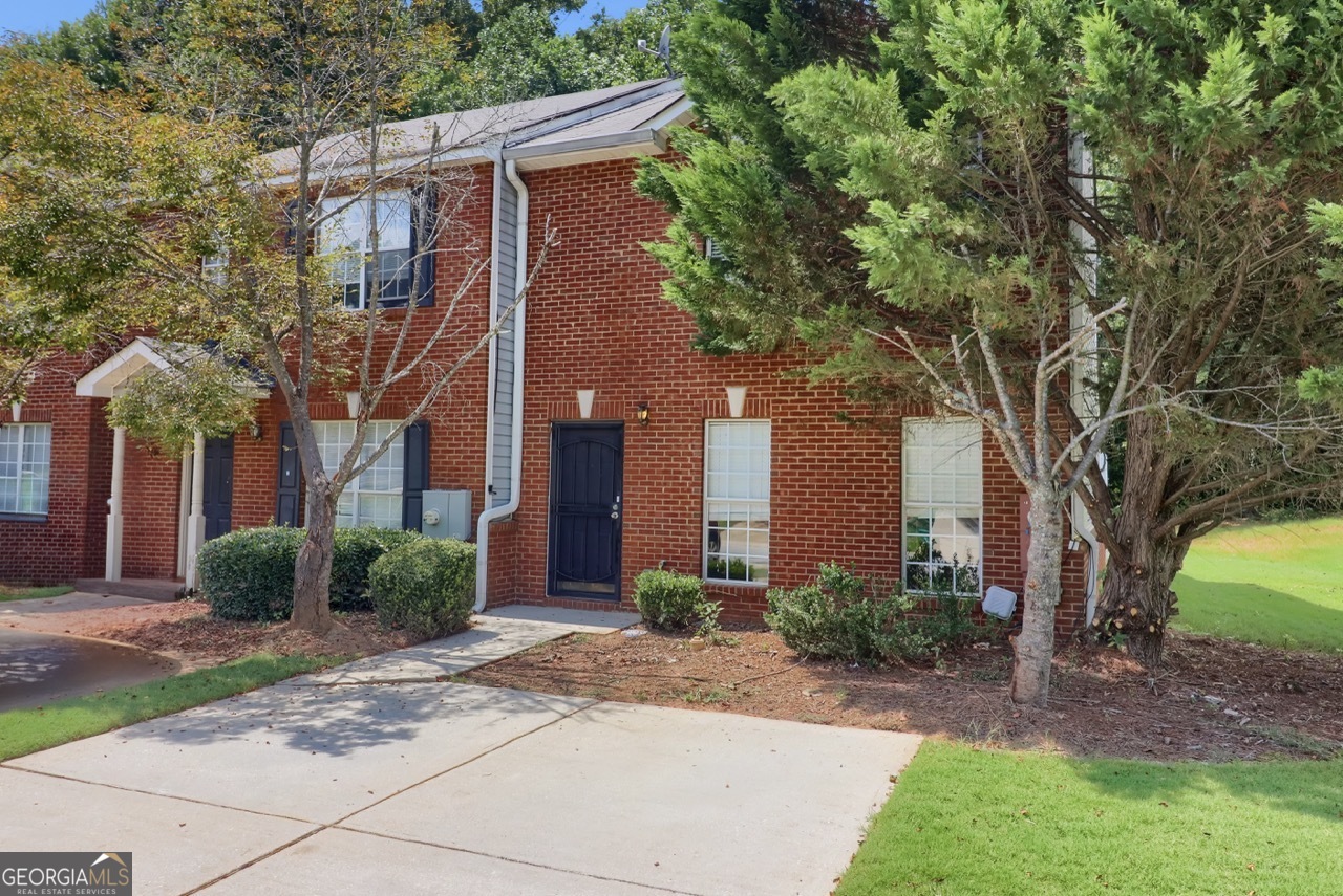 Come and see this beautifully renovated, move-in ready townhouse located in Decatur's quiet Waldrop Station neighborhood! Whether you are adding to your investment property portfolio or dreaming of your first home, this fully updated, affordable townhome ticks off all the boxes! Step inside to all new LVP flooring, a new kitchen including white cabinets, gorgeous quartz countertops with waterfall edge and quartz backsplash, and stainless appliances. New bathrooms, new light fixtures, new ceiling fans and fresh paint! This corner unit near the front of the community features a functional open-concept floor plan, living room flowing into the kitchen and dining area, and a convenient main level powder room. Upstairs find two spacious bedrooms and a full bath, walk-in closets, and the laundry room. Relax outside on the back patio, backing up to Flat Shoals Hudson Park, providing walking trail and tranquil bird watching! Convenient to Midtown, Buckhead, and Stonecrest Mall. Near I-20, I-285 and MARTA.