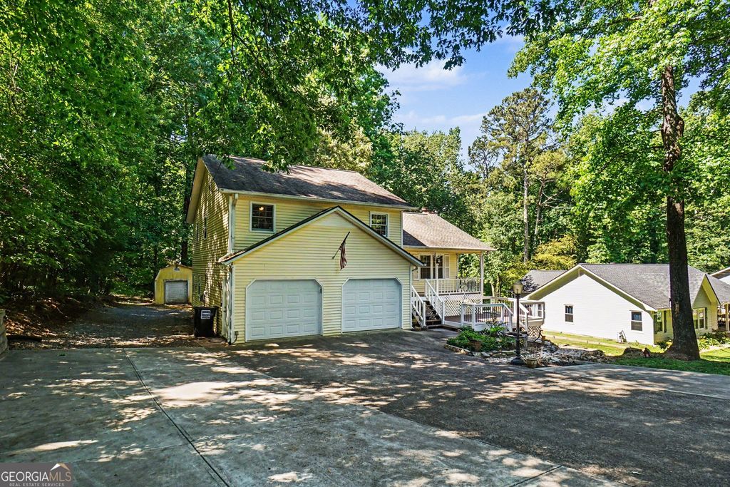 Photo of 174 W Mountain Oak Street, Canton, GA 30115 (MLS # 10755632)