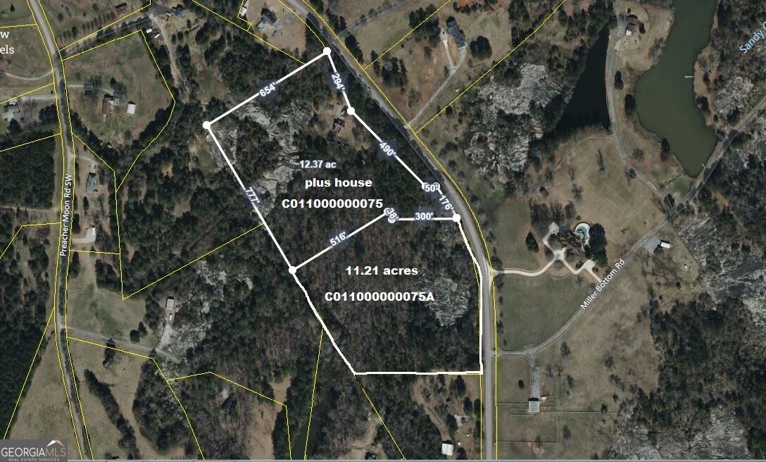 REDUCED PRICE! Beautiful 11.21 acre estate owned property located in Walton County off of Miller Bottom Road.This property is the ideal location for your dream home.Suitable for a family retreat,someone with livestock or plans for a family garden! This property is giving "country vibes" yet it is so close to the city! From a developer/builders eyes with A-1 zoning and road frontage approximately 730+/- feet, you could possibly yield 2 acre estate lots and build amongst the many Million Dollar plus homes up and down the street.This location is a stones throw from Rockdale County.Black Shoals Park is located 4 miles (8 minutes) from this property.Enjoy camping,fishing,canoeing,kayaking or simply walking the trails taking in the beautiful views of the 650 acre reservoir.Shown by appointment with at least 24 hour notice, property is not vacant.Sharon Elementary/Loganville Middle & Loganville High School District. As-is sale.Public Water & electric available.