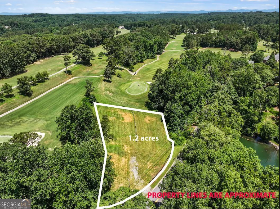CLUB DRIVE. ENJOY THE BENEFITS OF GOLF COURSE LIVING WITH NO HOA. RELATIVELY LEVEL LOT THAT BACKS UP TO CHATTAHOOCHEE GOLF CLUB - GREEN HOLE 12 AND IS ADJACENT TO A PAR 3 ON HOLE 13. BUILD YOUR OWN DREAM HOME WITH FRONT PORCH LAKE VIEWS. ALL SURROUNDING PROPERTY IS OWNED BY CHATTAHOOCHEE GOLF CLUB OR IS US CORP LAND. SOIL TESTING PREFORMED BY PREVIOUS OWNERS. CHATTAHOOCHEE COUNTRY CLUB MEMBERSHIP NOT INCLUDED IN PURCHASE. PROPERTY IS LESS THAN 5 MILES FROM THE GAINESVILLE SQUARE AND IS WITHIN 5 MILES OF 4 GROCERY STORES.
