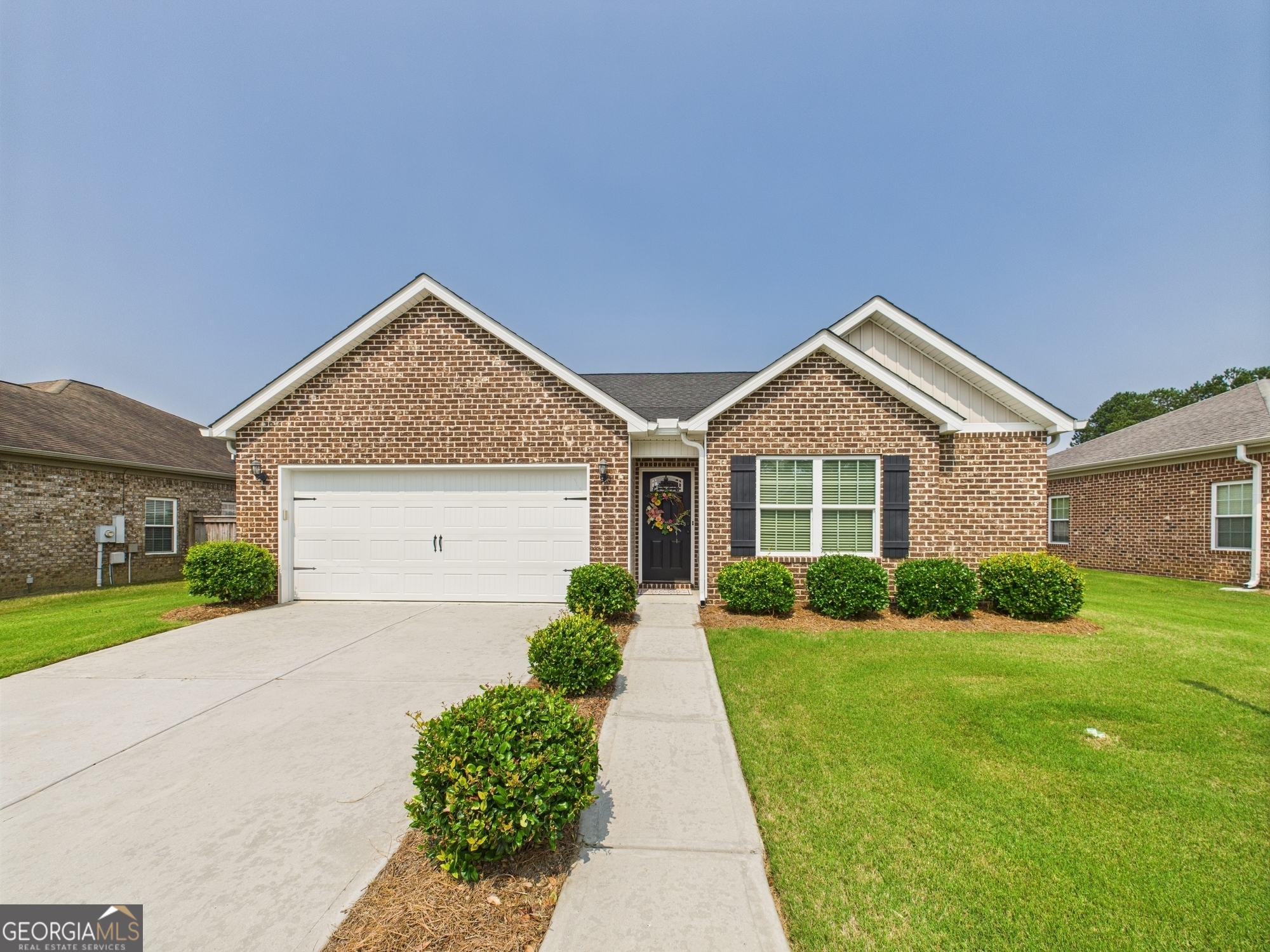 Welcome to this cozy and inviting 3-bedroom, 2-bath home located just minutes from I-75 in the heart of Byron, Georgia. Tucked inside a quiet, family-friendly neighborhood, this home offers exclusive access to fantastic community amenities-including a private pool, clubhouse, and playground. Whether you're relaxing by the pool, hosting an event in the clubhouse, or letting the kids burn off energy at the playground, this community is designed for comfort, fun, and connection. Inside, you'll find a warm and functional layout perfect for everyday living. The spacious master suite features a large bathroom with a double vanity, a soaking tub, and a separate shower, creating your own peaceful retreat after a long day. The kitchen includes a convenient bar area for extra dining space, ideal for casual meals or entertaining guests. Enjoy outdoor living on the covered back patio and swing, and take advantage of the 2-car garage for parking and storage. This home offers the perfect blend of small-town charm and modern convenience and an HOA that takes care of the landscaping-close to shopping, dining, and easy interstate access. Don't miss your opportunity to join a welcoming neighborhood with unbeatable amenities. Schedule your private showing today!