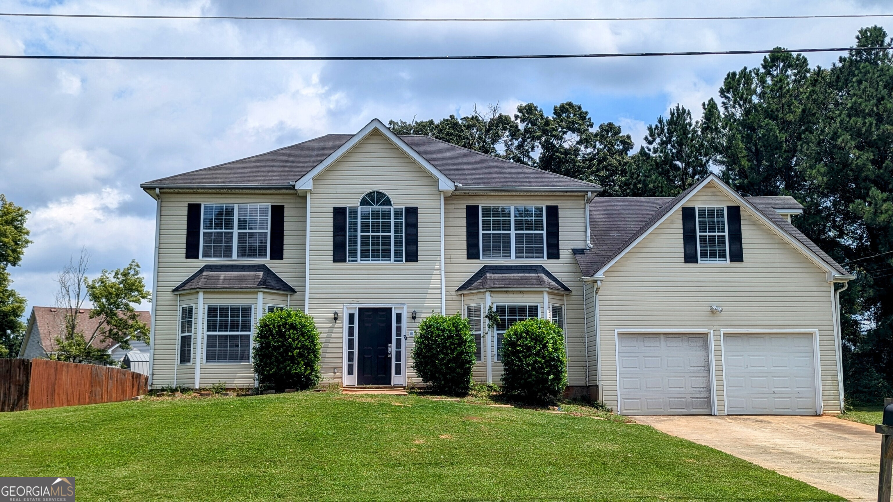 This 4-bedroom, 3-bath home offers a functional layout with the convenience of laundry hook up on the main level. The foyer opens to multiple living and dining spaces, including a bay-windowed sitting room and a separate dining area. The kitchen features ample cabinetry and flows into the main living room with a cozy fireplace and access to the backyard. Upstairs, you'll find generously sized bedrooms, including a large bonus room perfect for a guest suite or office. With fresh carpet, neutral paint, and plenty of natural light throughout, this home is ready for its next owner! **Agents: Please read private remarks/look at the offer guidelines in docs before calling, it should answer all questions you have.**