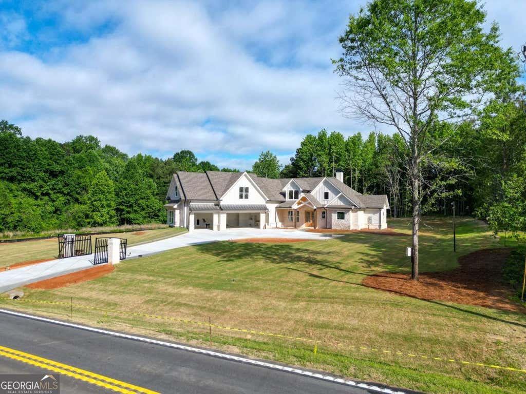 Photo of 2889 Briscoe Road, Loganville, GA 30052 (MLS # 10776199)