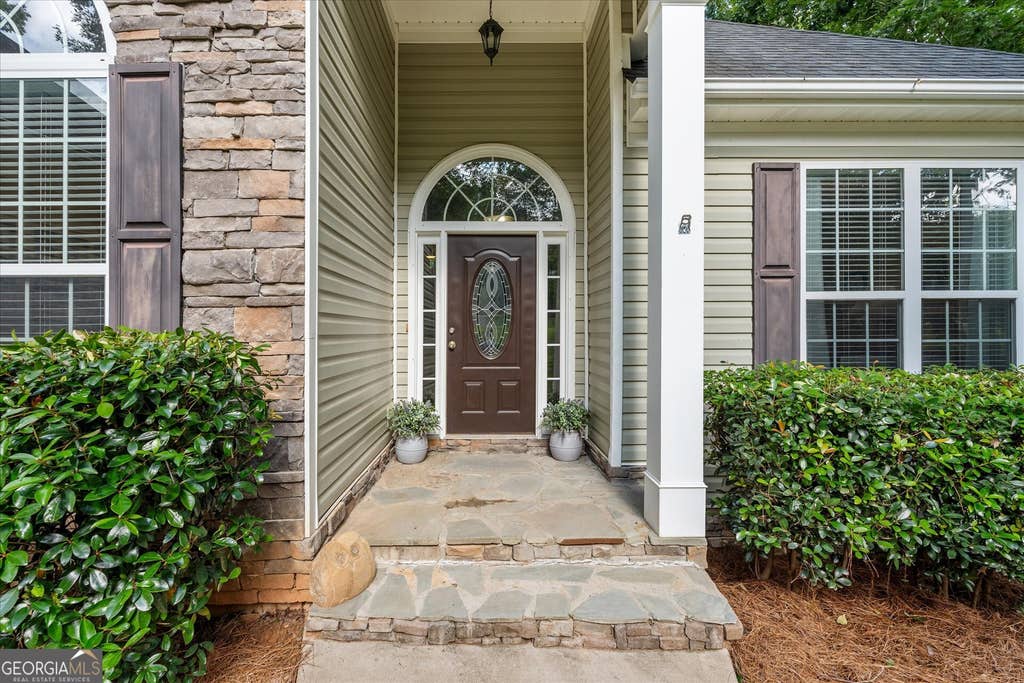 Photo of 7055 Fletcher Dr, Winston, GA 30187 (MLS # 10832821)