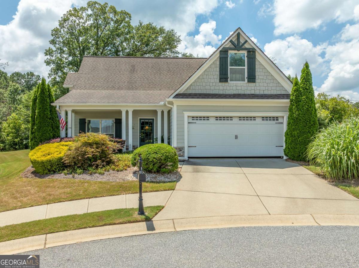 Ball Ground Georgia 30107 is THE zip code for choosing the great life. Great location, well planned community and super convenient for everyday living. Travel to work? No problem, jump on 575 and head North or South. Minutes from Canton, Alpharetta and Cumming. Home offers first floor living with primary bed, bath, laundry and garage a few steps from kitchen. Screened porch invites you to have a cold glass of tea or a morning cup of coffee. Family living upstairs with 3 nice size bedrooms and bath. Create a home office or fix rooms for guests. Options for your creativity to become reality. If pickle ball, morning coffee or a nice long walk to Long Swamp Creek interest you then you really need to put this one on your wish list. The charming downtown area of Ball Ground feature unique shopping and dining. Ice Cream or New York Style pizza and a stroll through Calvin Farmer Park round out a great day in the tiny city with the big heart. Welcome to the best kept secret in North Georgia. Retirement or first time buyer this home will not last!