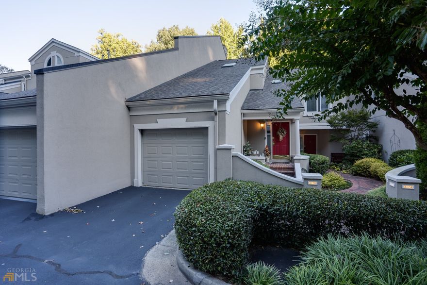 Get ready to live in an amazing location right in the heart of the exclusive Vining's neighborhood. Freshly painted living room, master bath and ceilings throughout, this 2 bed 2 bath condo offers large bedrooms, generous closet space, carpet throughout the main living area, and a spacious 1 car garage with a new garage door. Upon entry you are greeted by a vaulted foyer that leads up to one level living! New Can lighting throughout as well as new skylights. Enjoy a large living room with fireplace and doors leading out to a large private deck with new deck boards. Newly renovated kitchen with butcher block countertops, new backsplash and a new sink and faucet, plus a new garbage disposal with countertop airswitch. Oversized Primary Ensuite Bedroom with 2 walk in closets and spa like bath with jetted tub, double vanity with built in lights and a separate shower and butcher block countertops with new sinks and faucets. A new roof was replaced in 2018 and HVAC was replaced in 2017. Less than 2 miles to both 75 and 285. Cobb county taxes with an Atlanta address. Close to trails, malls, shopping, convention centers, the Atlanta Braves stadium/ Minutes to downtown Atlanta.