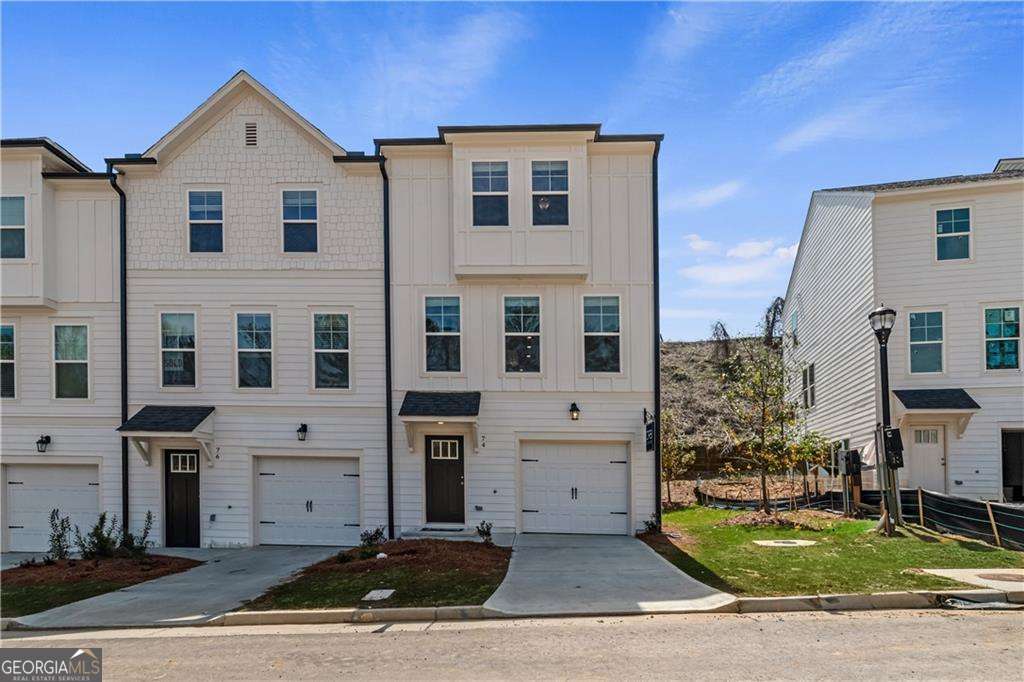 DRB NOW SELLING THE BROOKGREEN PLAN AT MONTICELLO!!! Stunning Three-Story 3 bedrooms, 2 full baths, 2 half baths! Upstairs on the second level enjoy cooking in your gorgeous kitchen with ample cabinets, a beautiful kitchen island with pendant lights, Quartz countertops with a tile backsplash, and stainless-steel appliances including the refrigerator. Open concept living with your powder room off to the side, you have your breakfast area and family room giving you the best space to call Home. On the third level enjoy serenity in your spacious Owner suite with tray ceilings, his and her walk-in closets, and a spa-like bathroom with double vanity and wall-to-wall shower. On the opposite side you have two spacious secondary bedrooms pre-wired for ceiling fans and a full bathroom. Laundry in hall with Washer & Dryer included. One-car garage with one-car parking pad, garage door opener included. Window screens and blinds throughout included. Located a few miles from the Airport, 15 minutes from Downtown Atlanta, and 13 minutes or less from the Atlanta Beltline Eastside Trail, Colleges and Mercedes Benz Stadium. Just 3 minutes from Porsche Experience. Excellent connectivity to major highways and Marta. Monticello offers luxury townhome living with an easy low maintenance lifestyle. *Photos do not reflect actual Townhome being built. Hours of Operation: Mon-Sat, 10AM to 6PM and Sun, 1PM to 6PM. Please note: If the buyer is represented by a broker/agent, DRB REQUIRES the buyer's broker/agent to be present during the initial meeting with DRB's sales personnel to ensure proper representation.