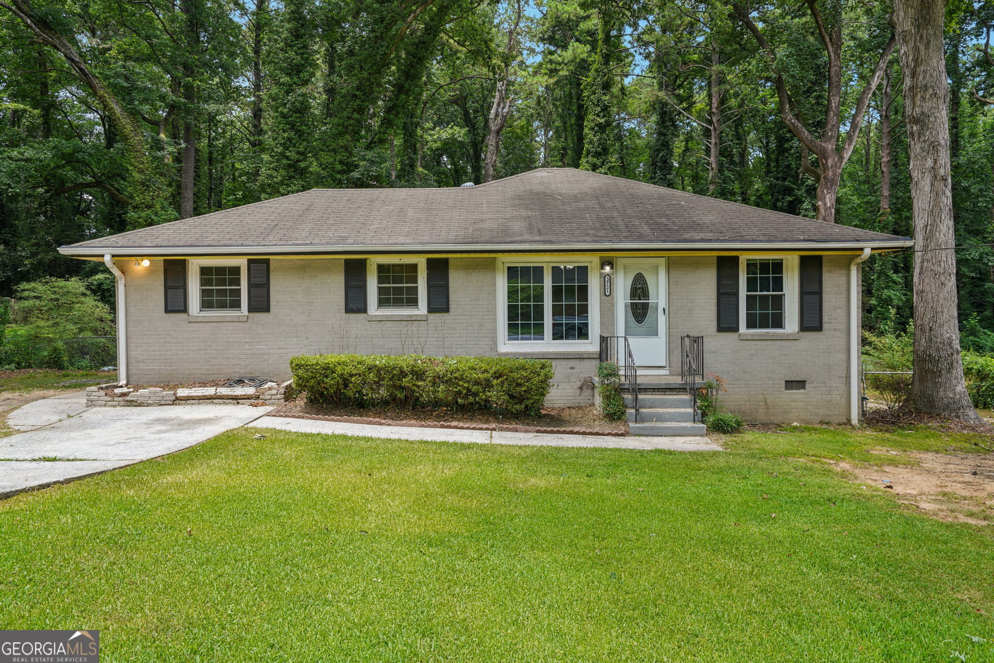 Charming All-Brick Home Offering Space, Value, and Location! This well-priced, move-in ready 4-bedroom brick home is full of potential and perfectly located for convenience near the Atlanta Airport, Tyler Perry Studios, and major travel routes. With a flexible layout that includes a spacious living room, kitchen, and an additional flex room ideal for a media room, playroom, or split as a dining room/family room, this home offers versatility for today's lifestyle. The all-brick exterior adds timeless appeal and durability, while the interior provides a comfortable, functional layout ready for your personal touch. A smart opportunity for homeowners or investors looking for space, location, and value in one package!