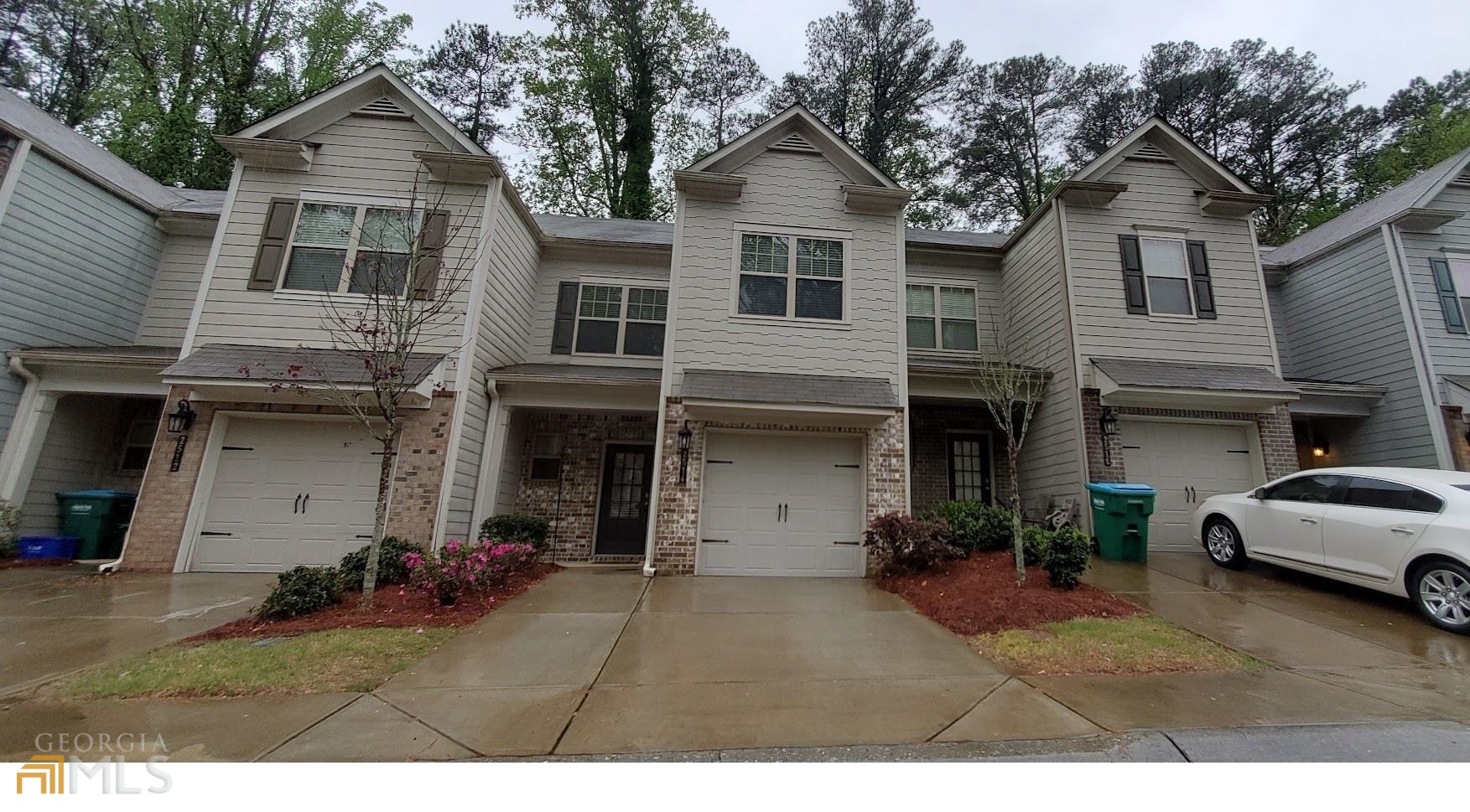 For Rent or Sale ! Gorgeous townhouse in a great location minutes to I-85, I-285 & HWY 141. Lovely 3bed/2.5bath, Hardwoods throughout the first level. Open kitchen with granite countertops, mahogany cabinets, subway-style tiled backsplash, and stainless appliances. The kitchen overlooks a cozy family room. Fridge and washer and dryer included. Upstairs master bedroom with walk-in closets and double vanities, soaking tub, and separate shower. Two additional nicely sized bedrooms upstairs. 1 car garage. Private backyard. Lawncare and Pool Community!