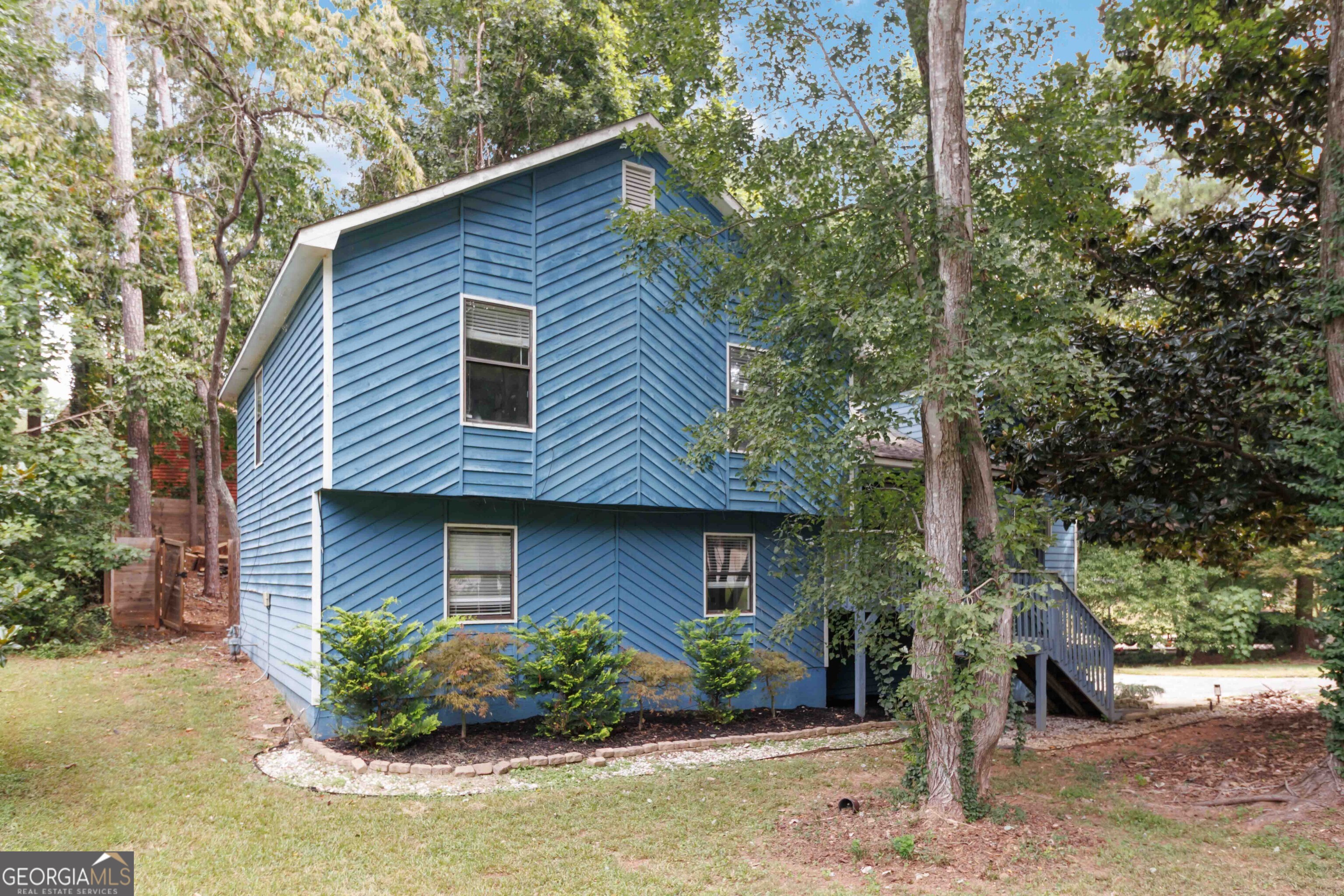 Spacious Split-Level Home with Great Potential! This 4-bedroom, 3-bath split-level home offers a fantastic opportunity to create your dream space! Nestled in a quiet neighborhood, it features a charming front porch, a covered back deck perfect for relaxing or entertaining, and a fully fenced backyard with room to play, garden, or gather. Inside, the home offers a versatile layout with generous living areas and plenty of natural light. While it does need some repairs, it's a great opportunity for buyers looking to add their personal touch or investors seeking a valuable project. Don't miss the chance to make this home your own and build instant equity schedule your showing today!