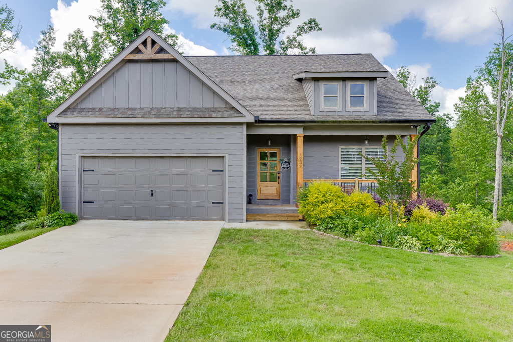 Welcome to Your Dream Home in Commerce! Built in 2021, this stunning residence offers spacious, refined living with thoughtful design and upscale finishes throughout-far from your standard builder-grade home. Situated on over 2 peaceful acres in a quiet cul-de-sac, this property provides the perfect balance of privacy, tranquility, and convenience. The main level features a luxurious primary suite complete with a spa-like ensuite bathroom and generous walk-in closets, offering a serene private retreat. You'll also find two additional bedrooms, a full bath, and a well-placed laundry room on this floor. The open-concept layout seamlessly connects the living, dining, and kitchen areas, creating an inviting space for everyday living and entertaining. Step outside to the screened-in porch or open-air deck, perfect for morning coffee or evening barbecues while enjoying the sounds of nature. Upstairs, a spacious fourth bedroom with its own full bath offers ideal accommodations for guests or family members seeking extra privacy. The fully finished terrace level expands your living space even further, featuring a large open area perfect for entertaining, relaxing, or hosting movie nights. This level also includes a versatile flex room that can serve as a guest room, home gym, or hobby space, an additional office area, another full bathroom, and two large unfinished rooms perfect for storage or future expansion. With its smart, flexible layout and elegant detailing, this home is designed for modern living and effortless comfort. Located just minutes from shopping outlets, restaurants, and major highways, you'll enjoy easy access to popular destinations like Lake Hartwell, Helen, Lake Lanier, and Athens.