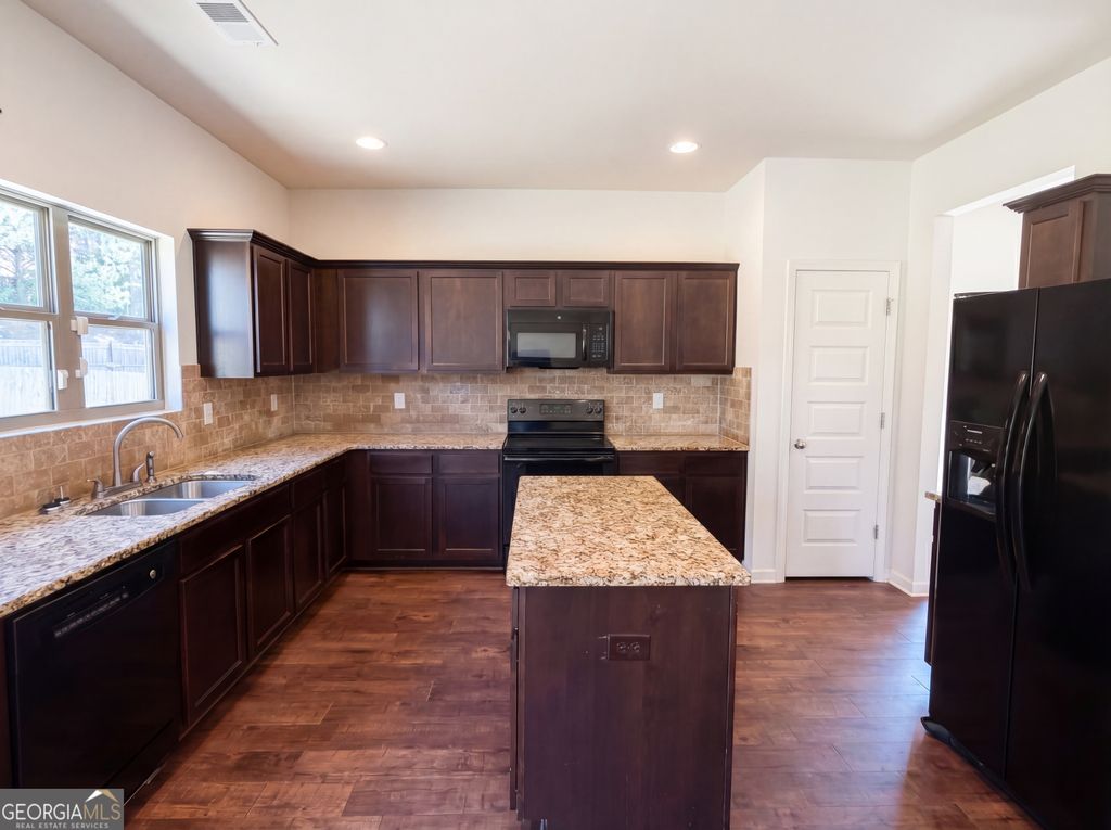 Photo of 1234 England Terrace, Hampton, GA 30228 (MLS # 10733477)