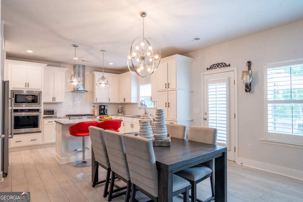 Photo of 6110 Banyan Trail, Cumming, GA 30028 (MLS # 10833532)