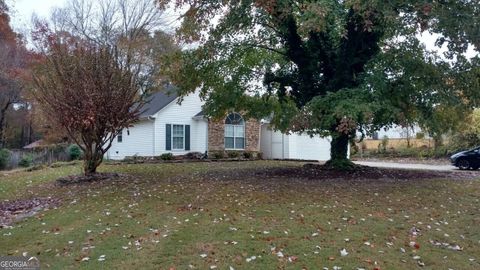 Photo of 609 Magnolia Drive, Loganville, GA 30052 (MLS # 10649959)