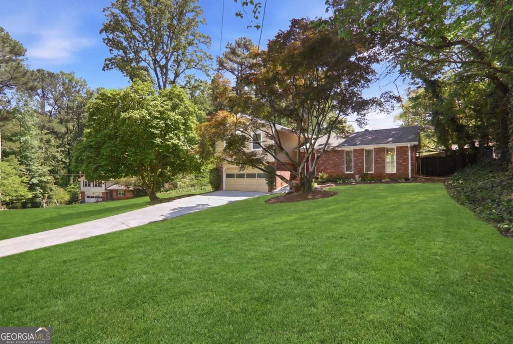 Photo of 5642 Breezy Court SW, Lilburn, GA 30047 (MLS # 10740141)