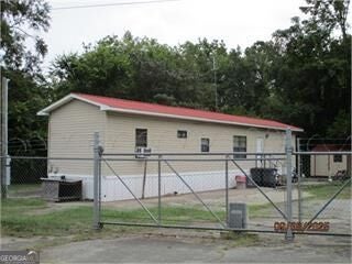 Photo of 420 W Trilby Street, Wrightsville, GA 31096 (MLS # 10858145)