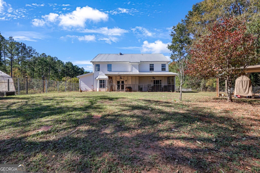 Photo of 1599 Lower River Road, Covington, GA 30016 (MLS # 10880825)