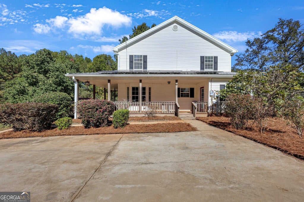 Photo of 1599 Lower River Road, Covington, GA 30016 (MLS # 10880825)